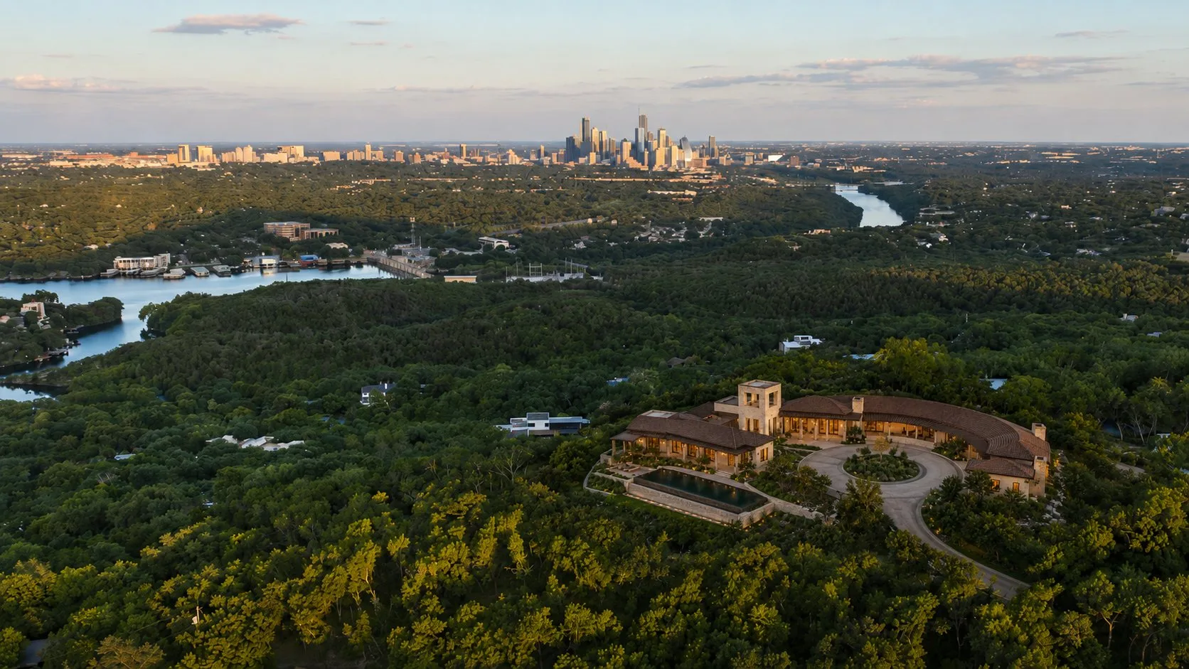 Conceptual rendering of a low stone estate organized around the hilltop view